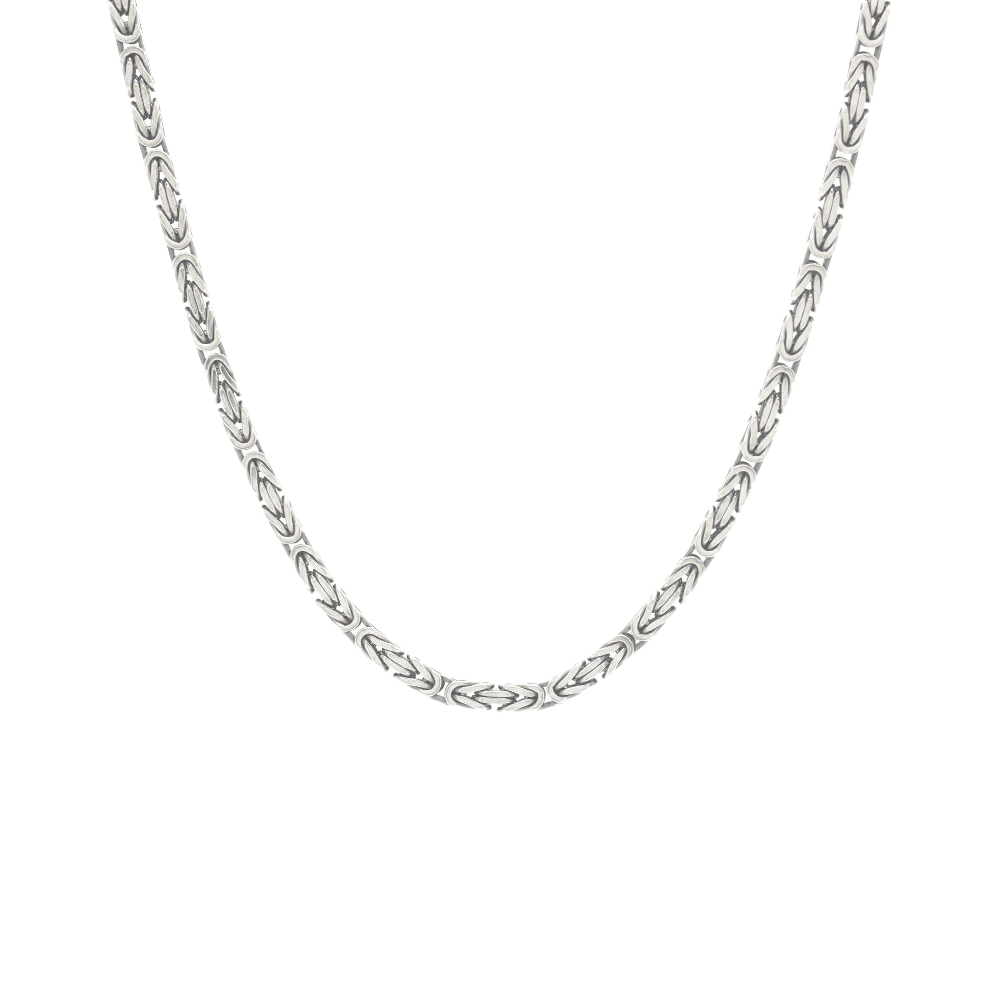 A silver-toned chain necklace with a textured, braided link design, shown against a plain white background.