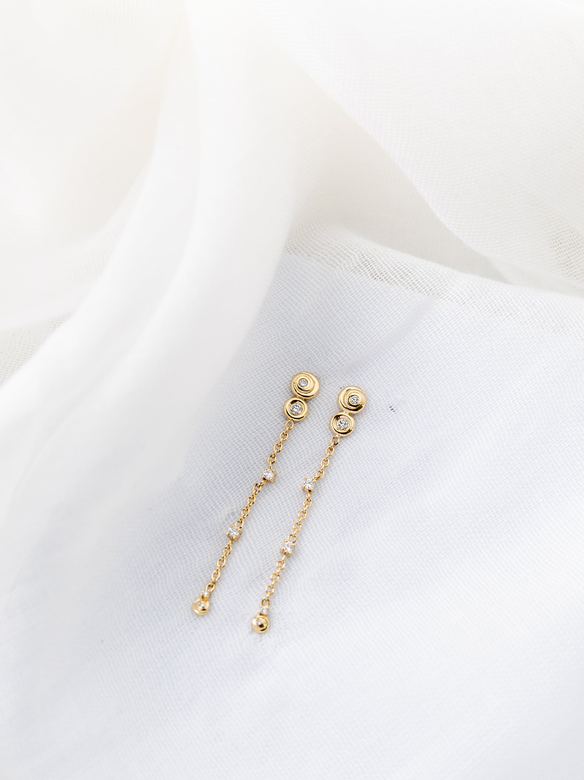 Anna Earrings in 14K gold with white diamond spiral threader design
