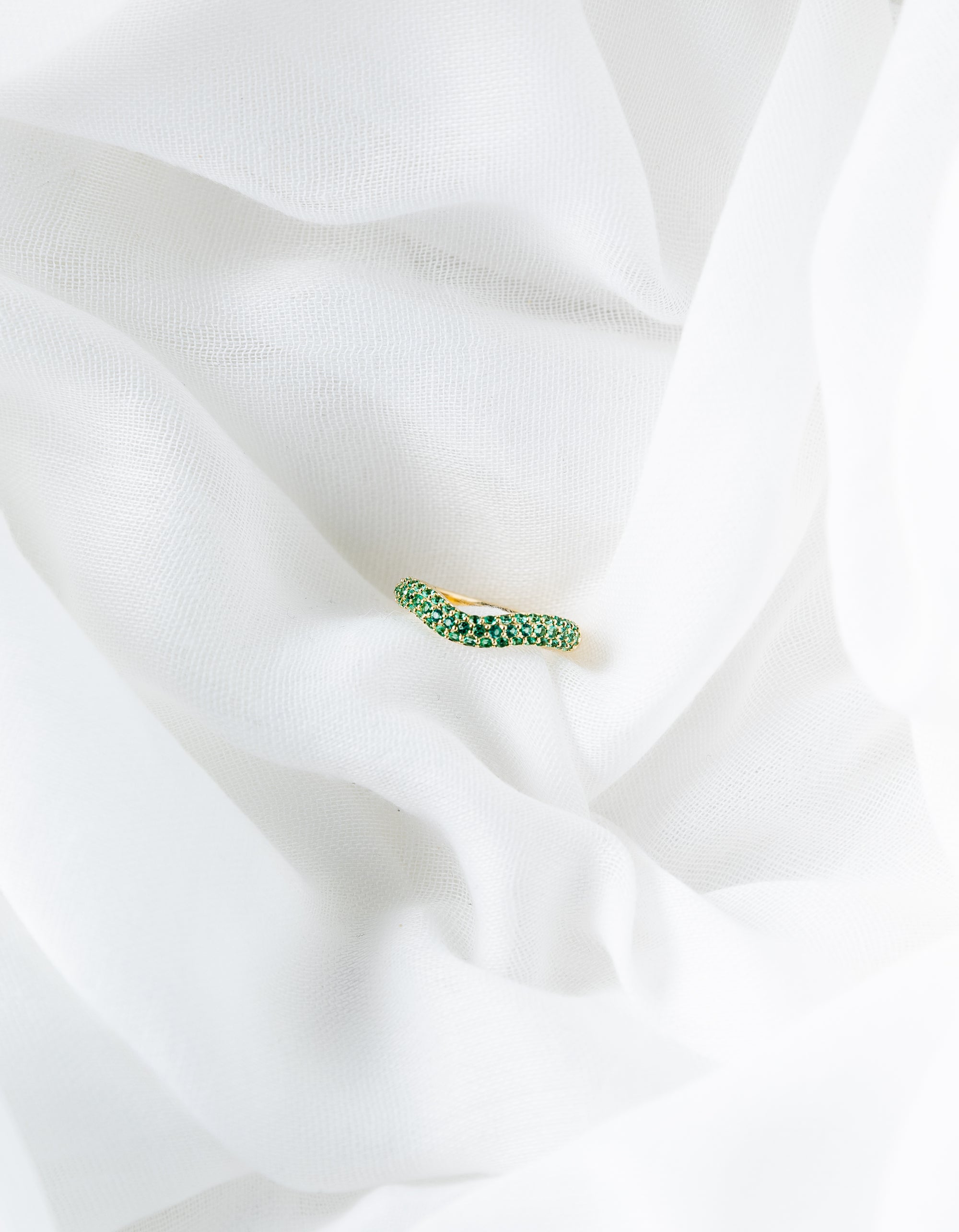 Beth Ring in 14K gold with pavé emerald and wave design