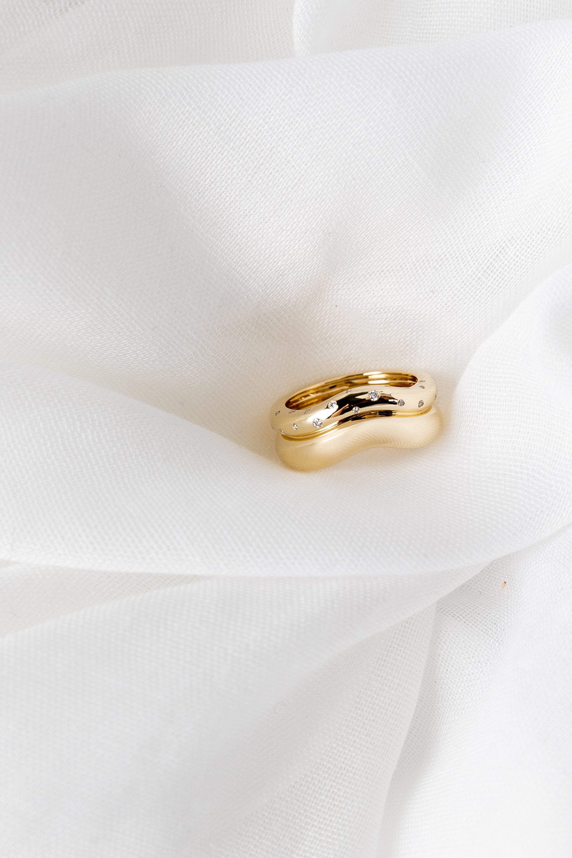 Shari Ring in 14K yellow gold with scattered white diamonds and wave bands